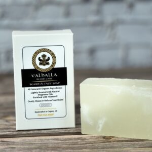 A bar of soap next to a package.