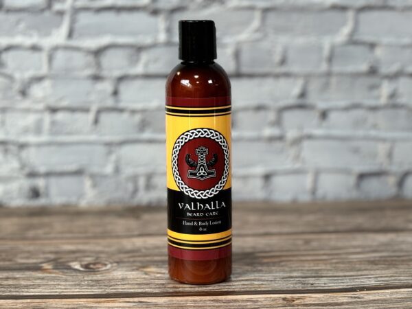 A bottle of valhalla hair oil sitting on top of a table.