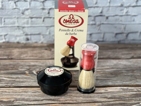 A box of cream and a container with some food on it