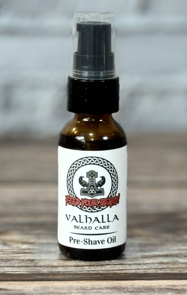 A bottle of beard oil sitting on top of a table.