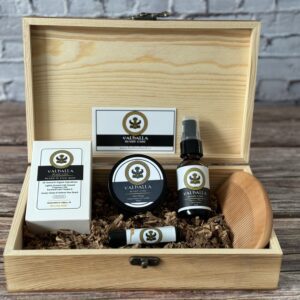 A wooden box with some items in it